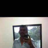 Chofer de camion. Mujer de unos 40años.